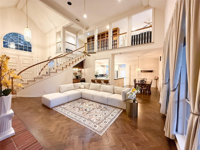 7100 Deer Run, Plano, TX 75024 - living area featuring high vaulted ceiling, stairway, baseboards, and beamed ceiling