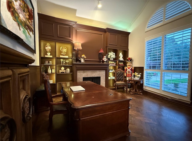 7100 Deer Run, Plano, TX 75024 - office space featuring a fireplace, wainscoting, vaulted ceiling, and a decorative wall