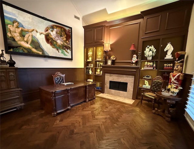 7100 Deer Run, Plano, TX 75024 - living area featuring lofted ceiling, a tile fireplace, and wainscoting