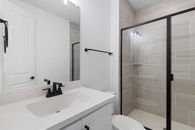 1041 Adair Rd, Prosper, TX 75078 - bathroom featuring toilet, vanity, and a shower stall