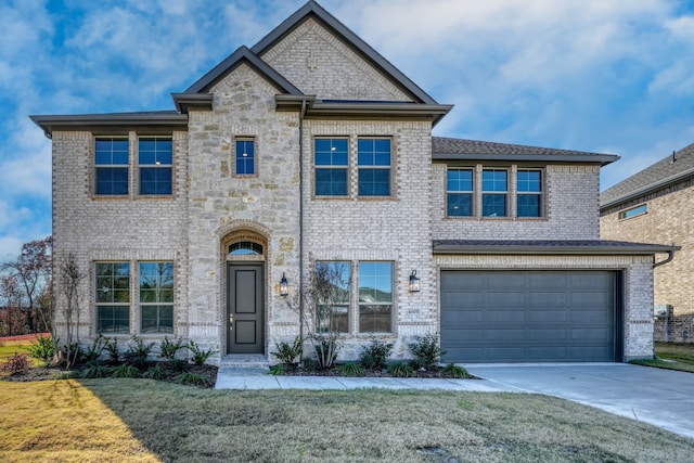 4005 Hollandwood Dr, Mckinney, TX 75071 - view of front of property with driveway, a garage, a front lawn, and brick siding