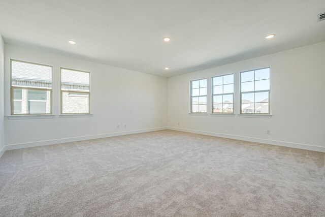 4005 Hollandwood Dr, Mckinney, TX 75071 - empty room with light colored carpet, recessed lighting, and baseboards