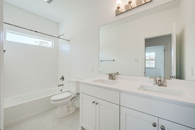 4005 Hollandwood Dr, Mckinney, TX 75071 - full bathroom featuring toilet, tile patterned flooring, double vanity, and tub / shower combination