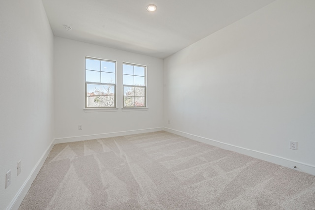 4005 Hollandwood Dr, Mckinney, TX 75071 - unfurnished room featuring light colored carpet, baseboards, and recessed lighting