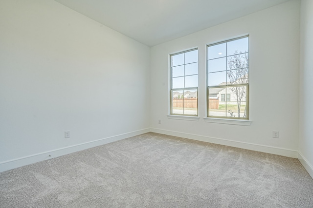 4005 Hollandwood Dr, Mckinney, TX 75071 - spare room featuring light carpet and baseboards