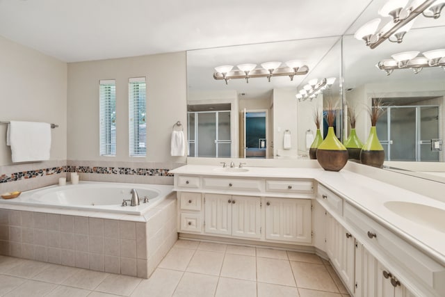 6920 Flintcove Dr, Dallas, TX 75248 - full bathroom with tile patterned floors, a shower stall, a tub with jets, and double vanity