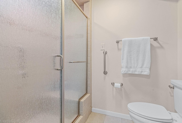 2012 Island Cir, Tool, TX 75143 - bathroom featuring toilet, a stall shower, tile patterned floors, and baseboards