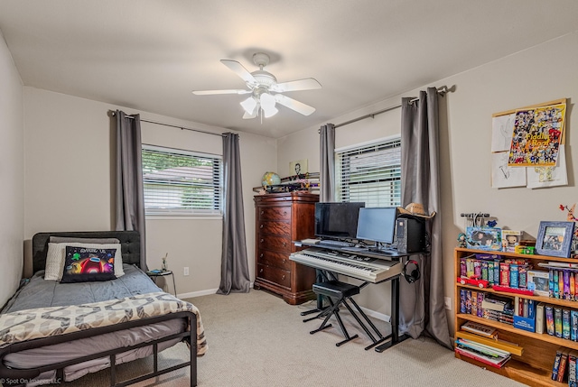 2012 Island Cir, Tool, TX 75143 - bedroom featuring light colored carpet, baseboards, and a ceiling fan