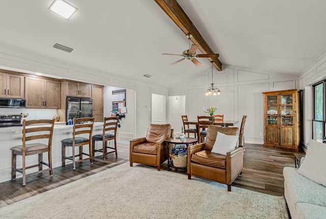 2012 Island Cir, Tool, TX 75143 - living room with dark wood-type flooring, a ceiling fan, and a decorative wall