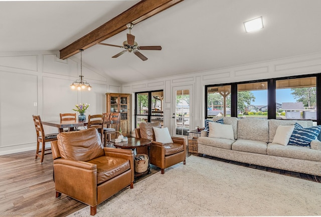 2012 Island Cir, Tool, TX 75143 - living room featuring a decorative wall, ceiling fan, and wood finished floors