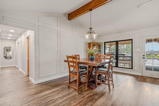 2012 Island Cir, Tool, TX 75143 - dining area featuring a decorative wall, wood finished floors, and a chandelier