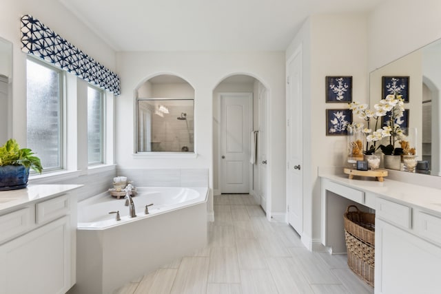 14326 Sedgegrass Dr, Frisco, TX 75033 - full bathroom with healthy amount of natural light, a shower stall, vanity, and a bath