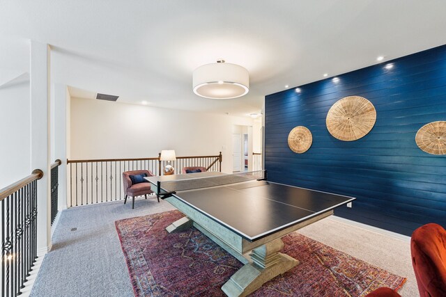 14326 Sedgegrass Dr, Frisco, TX 75033 - rec room featuring carpet floors, an accent wall, recessed lighting, and wooden walls