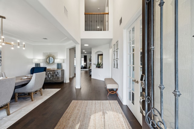 14326 Sedgegrass Dr, Frisco, TX 75033 - entrance foyer with dark wood-style flooring and french doors