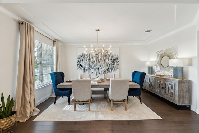 14326 Sedgegrass Dr, Frisco, TX 75033 - dining area featuring a chandelier, wood finished floors, baseboards, and crown molding