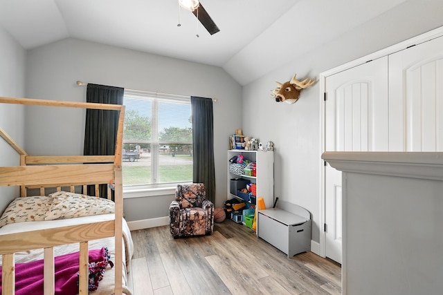 925 8th St, Tuscola, TX 79562 - bedroom with lofted ceiling, light wood-style flooring, a ceiling fan, and baseboards