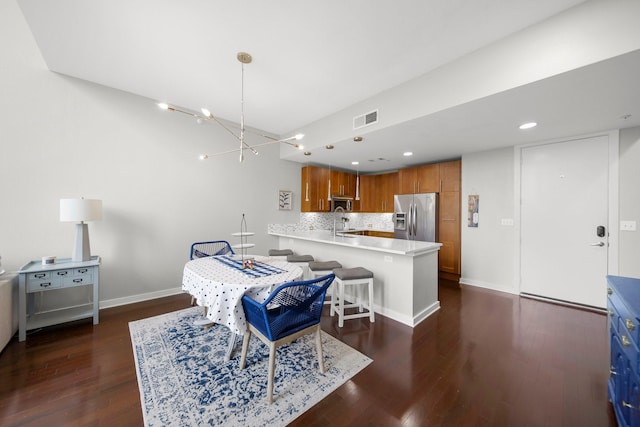 2608 Museum Way Unit 3417, Fort Worth, TX 76107 - dining area featuring dark wood-type flooring, baseboards, a chandelier, and recessed lighting