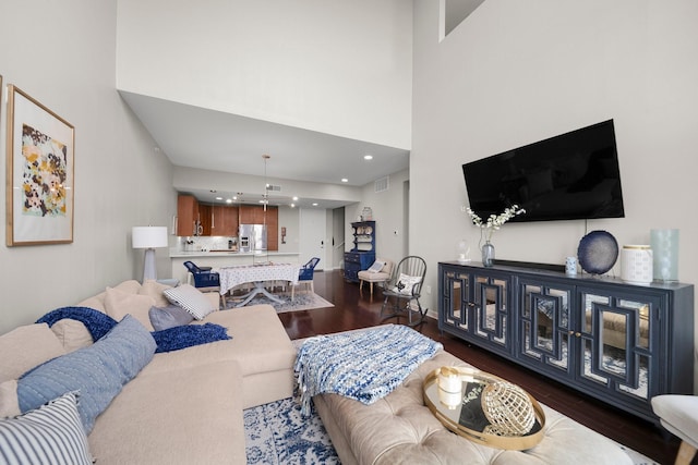 2608 Museum Way Unit 3417, Fort Worth, TX 76107 - living area with dark wood-type flooring, a high ceiling, and recessed lighting