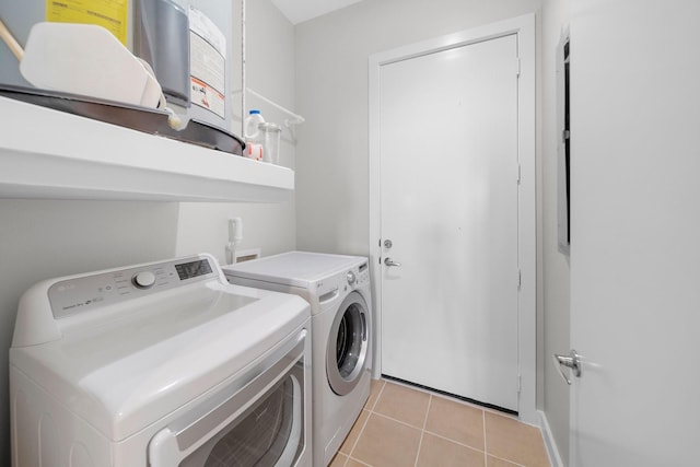 2608 Museum Way Unit 3417, Fort Worth, TX 76107 - laundry room featuring independent washer and dryer and light tile patterned floors