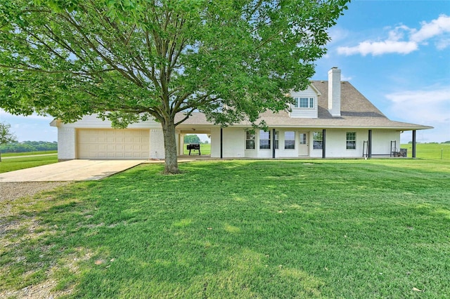11605 Fm 697, Whitewright, TX 75491 - view of front of property featuring driveway, a front lawn, a chimney, and a garage