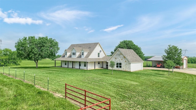 11605 Fm 697, Whitewright, TX 75491 - rear view of house with dirt driveway, covered porch, a garage, stone siding, and a shingled roof