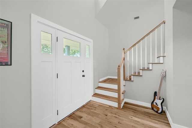 11605 Fm 697, Whitewright, TX 75491 - entrance foyer featuring light wood finished floors, stairs, and baseboards