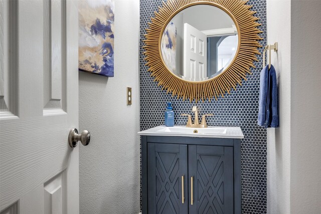 8230 Carter St, Lantana, TX 76226 - bathroom with vanity and a textured wall