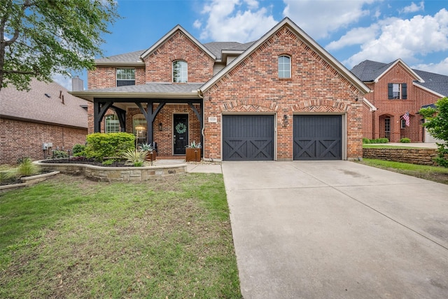 8230 Carter St, Lantana, TX 76226 - traditional home featuring brick siding, concrete driveway, a front lawn, a porch, and roof with shingles