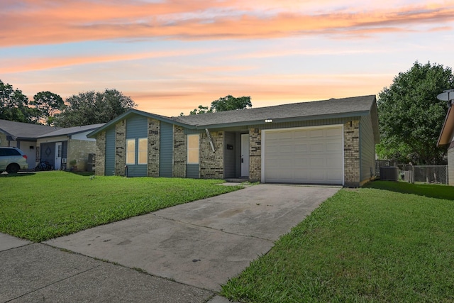 1509 Cedar Keys Dr, Lewisville, TX 75067 - mid-century home featuring driveway, brick siding, cooling unit, and a garage