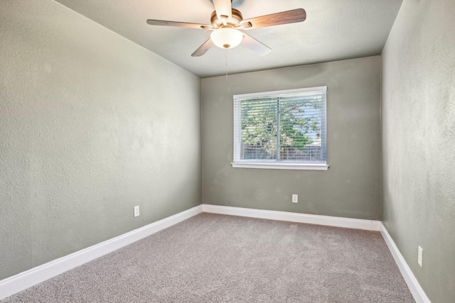 1509 Cedar Keys Dr, Lewisville, TX 75067 - unfurnished room featuring carpet, a ceiling fan, a textured wall, and baseboards