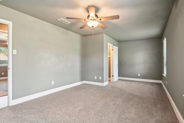 1509 Cedar Keys Dr, Lewisville, TX 75067 - unfurnished room with ceiling fan, carpet floors, and baseboards