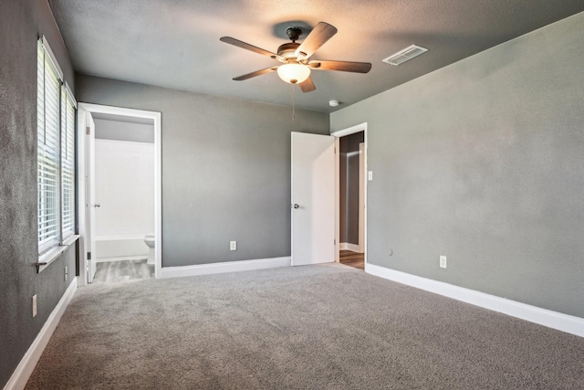 1509 Cedar Keys Dr, Lewisville, TX 75067 - unfurnished bedroom with carpet floors, baseboards, and ceiling fan