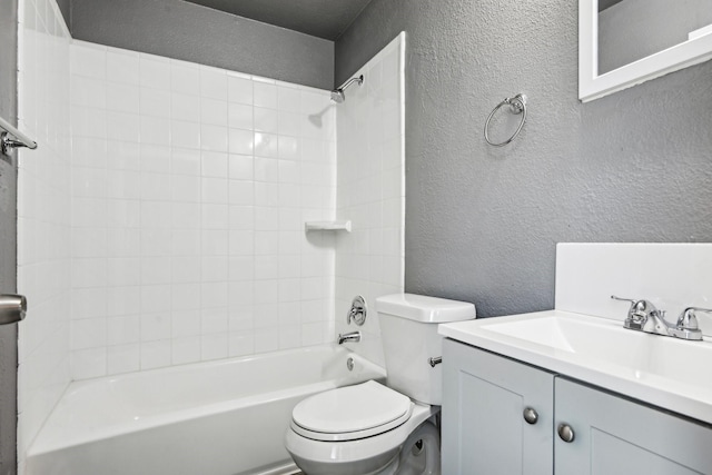 1509 Cedar Keys Dr, Lewisville, TX 75067 - full bathroom featuring a textured wall, toilet, bathing tub / shower combination, and vanity