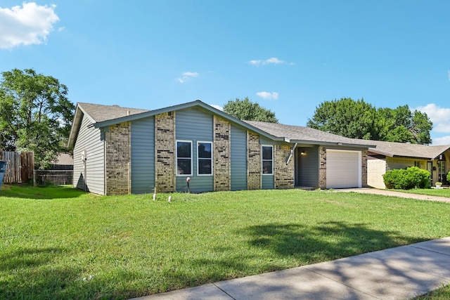 1509 Cedar Keys Dr, Lewisville, TX 75067 - mid-century modern home featuring brick siding, an attached garage, and driveway