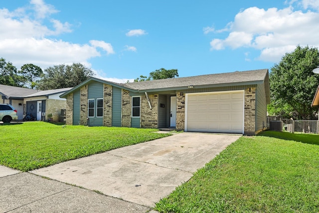 1509 Cedar Keys Dr, Lewisville, TX 75067 - view of front of house with concrete driveway, an attached garage, brick siding, and central AC