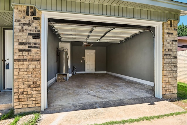 1509 Cedar Keys Dr, Lewisville, TX 75067 - garage featuring gas water heater, concrete driveway, and a garage door opener