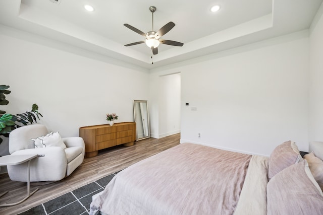 927 Leola Ln, Allen, TX 75013 - bedroom with a raised ceiling, recessed lighting, a ceiling fan, and dark wood finished floors