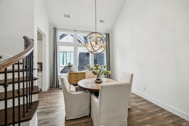 927 Leola Ln, Allen, TX 75013 - dining room featuring a chandelier, high vaulted ceiling, stairway, wood finished floors, and baseboards