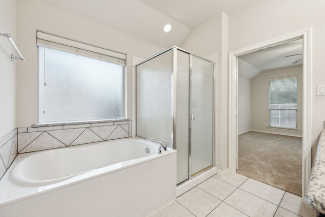 912 Kittery Dr, Desoto, TX 75115 - bathroom with a shower stall, a garden tub, lofted ceiling, and tile patterned floors