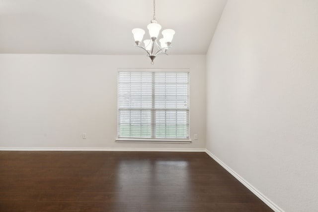 912 Kittery Dr, Desoto, TX 75115 - spare room with a chandelier, dark wood-style floors, baseboards, and vaulted ceiling