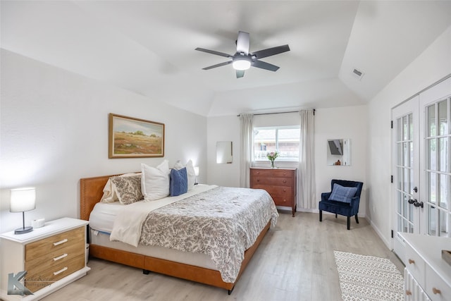 1518 Weavers Way, Abilene, TX 79602 - bedroom featuring french doors, light wood finished floors, vaulted ceiling, and a ceiling fan