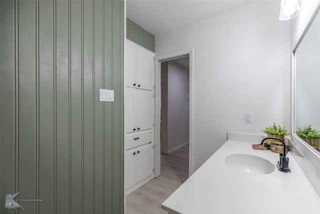 1518 Weavers Way, Abilene, TX 79602 - bathroom with wood finished floors and vanity