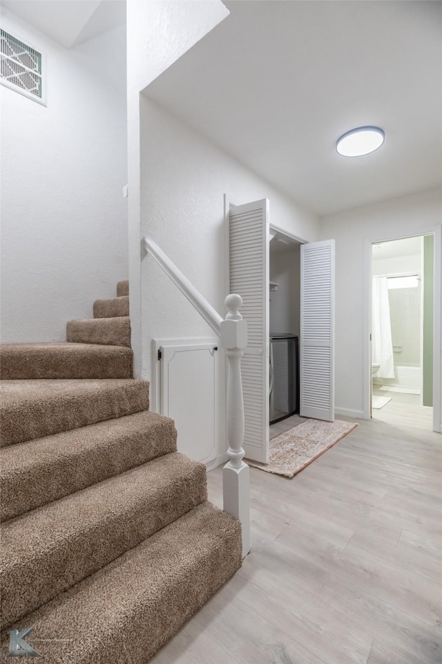 1518 Weavers Way, Abilene, TX 79602 - stairs with wood finished floors and baseboards