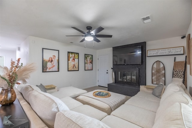 1518 Weavers Way, Abilene, TX 79602 - living room with ceiling fan, baseboards, and a brick fireplace