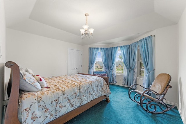 1114 Mount Ln, Rhome, TX 76078 - bedroom featuring carpet floors, a tray ceiling, and a chandelier