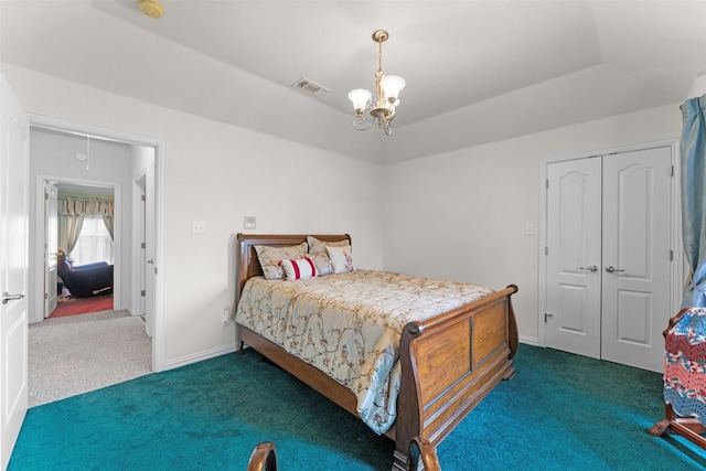 1114 Mount Ln, Rhome, TX 76078 - bedroom with carpet flooring, a chandelier, a closet, and baseboards