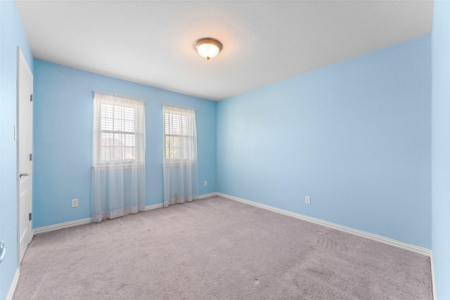 1114 Mount Ln, Rhome, TX 76078 - carpeted empty room featuring baseboards
