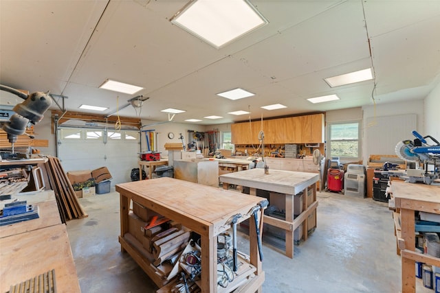 1114 Mount Ln, Rhome, TX 76078 - garage featuring a workshop area