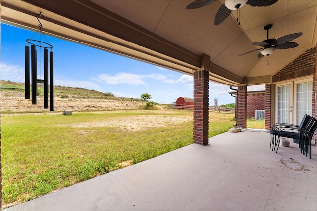 1114 Mount Ln, Rhome, TX 76078 - view of patio featuring a ceiling fan, a view of countryside, and french doors