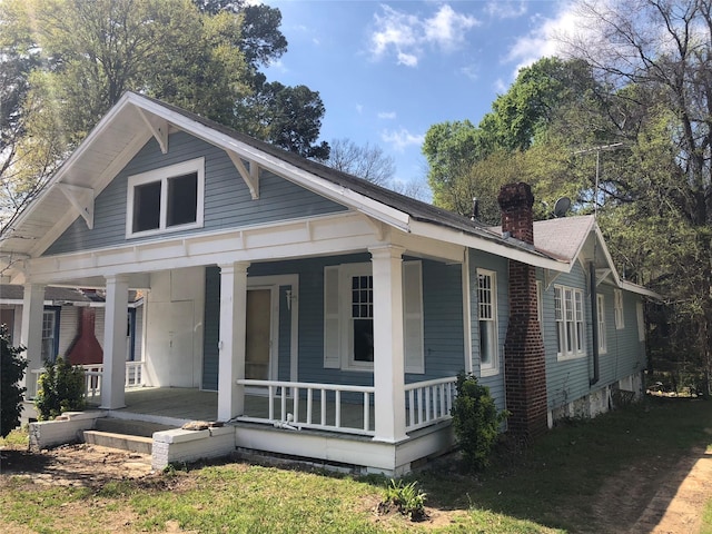 2424 Highland Ave, Shreveport, LA 71104 - view of front of property with a porch and a chimney